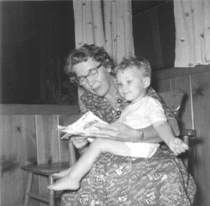 Reading with Nana, my maternal grandmother.  Probably around 2 years old.