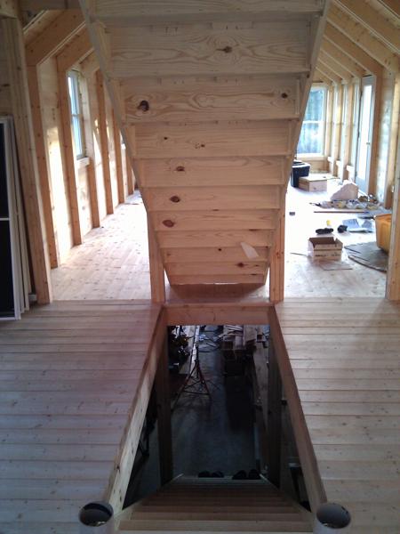 We chose to use prefabricated staircases instead of making them ourselves.  They were very heavy and required four people to lift into place, but they look good and saved a lot of work overall.