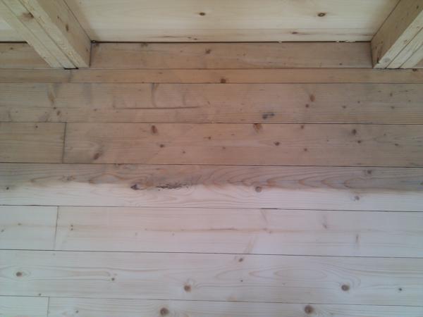 We didn't sand the floor sections that will be under the kitchen cabinets, and the difference is obvious.