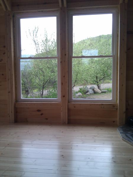 The Vermont PolyWhey (whey-based polyurethane) we've applied to the floors has a satin finish, but is still slightly shiny.