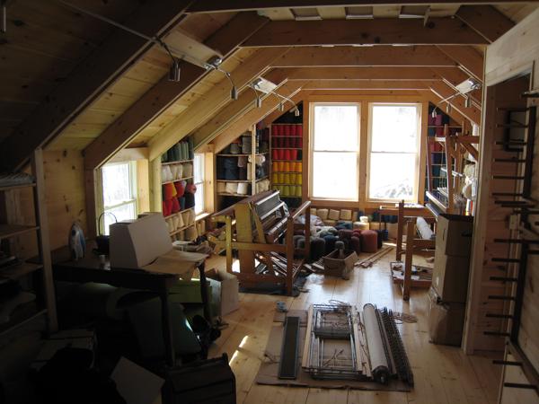 The larger room upstairs, used for fabric arts and crafts.