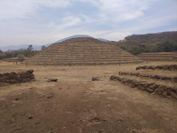 The main pyramid at Guachimontones, Teuchitlan.  It was built by the Aztecs to echo the shape of the volcano behind it.