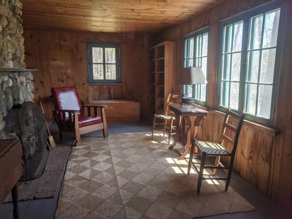 Sitting room on south side of Robert Frost Cabin
