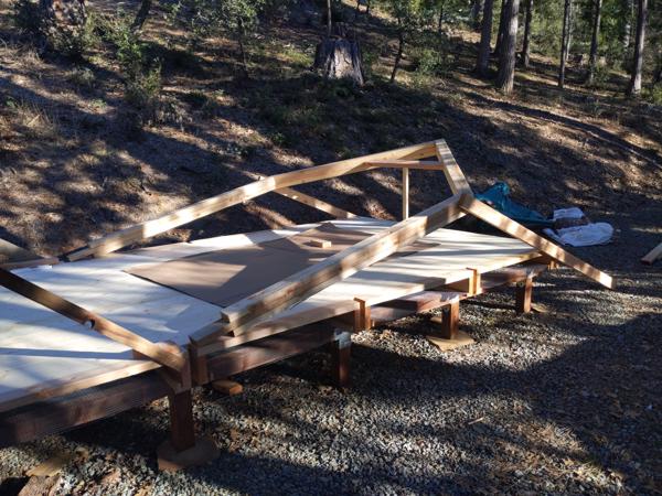 To raise a bent, I attached a leg to each side, then lifted the unit a couple of feet onto a stick.