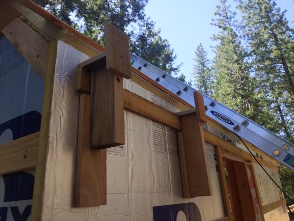 I designed jigs to hold the roof panels in place for installation.  These are temporarily attached to wall strapping.